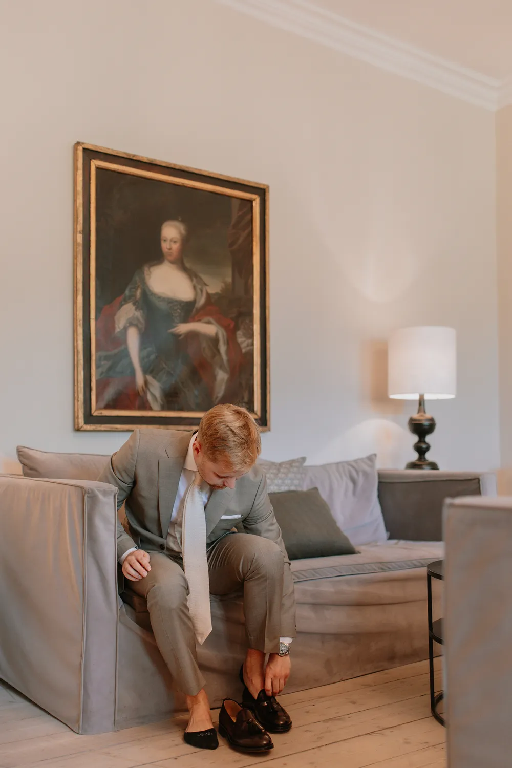 Timeless grooms portraits inside Holckenhavn Slot wedding suite