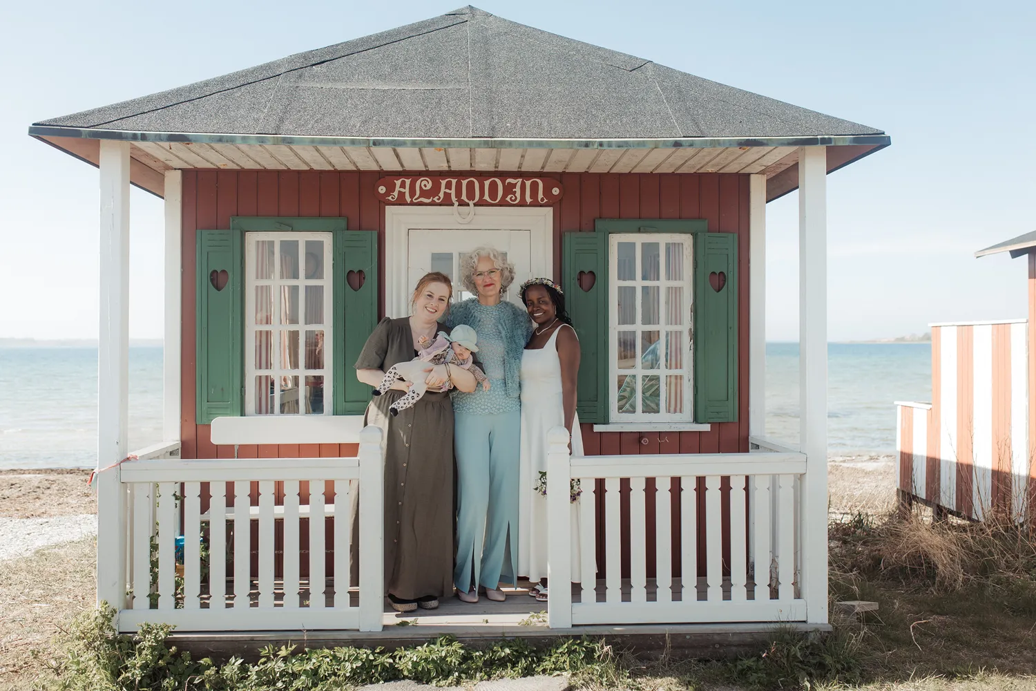 Documentary wedding portrait near colourful Danish architecture in Ærøskøbing.