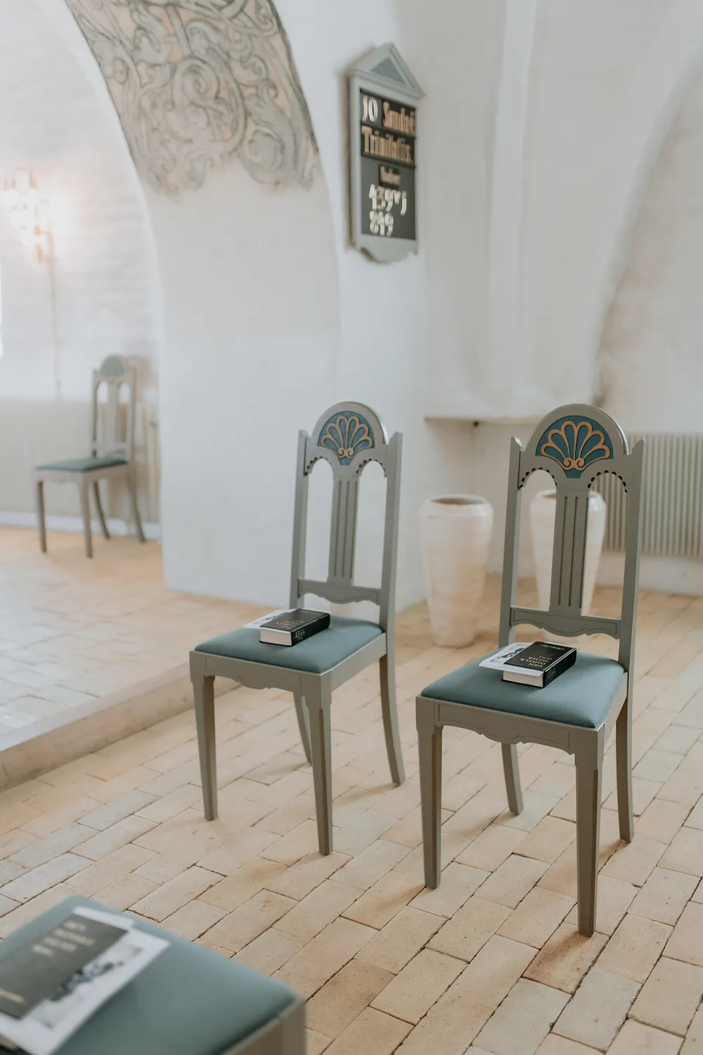 details of chairs before church wedding photography on Fyn in Denmark