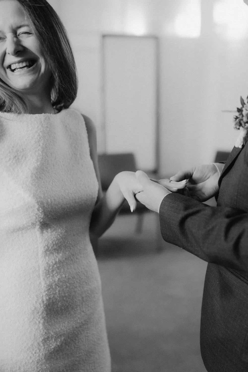 Bride smiling during relaxed wedding ceremony in Odense.