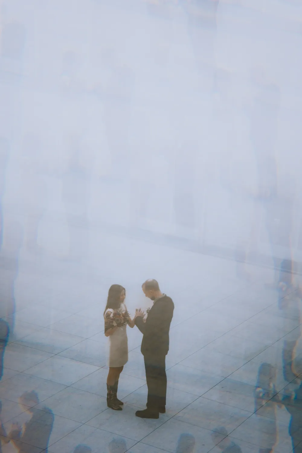Intimate civil wedding portraits inside Odense City Hall in Denmark.