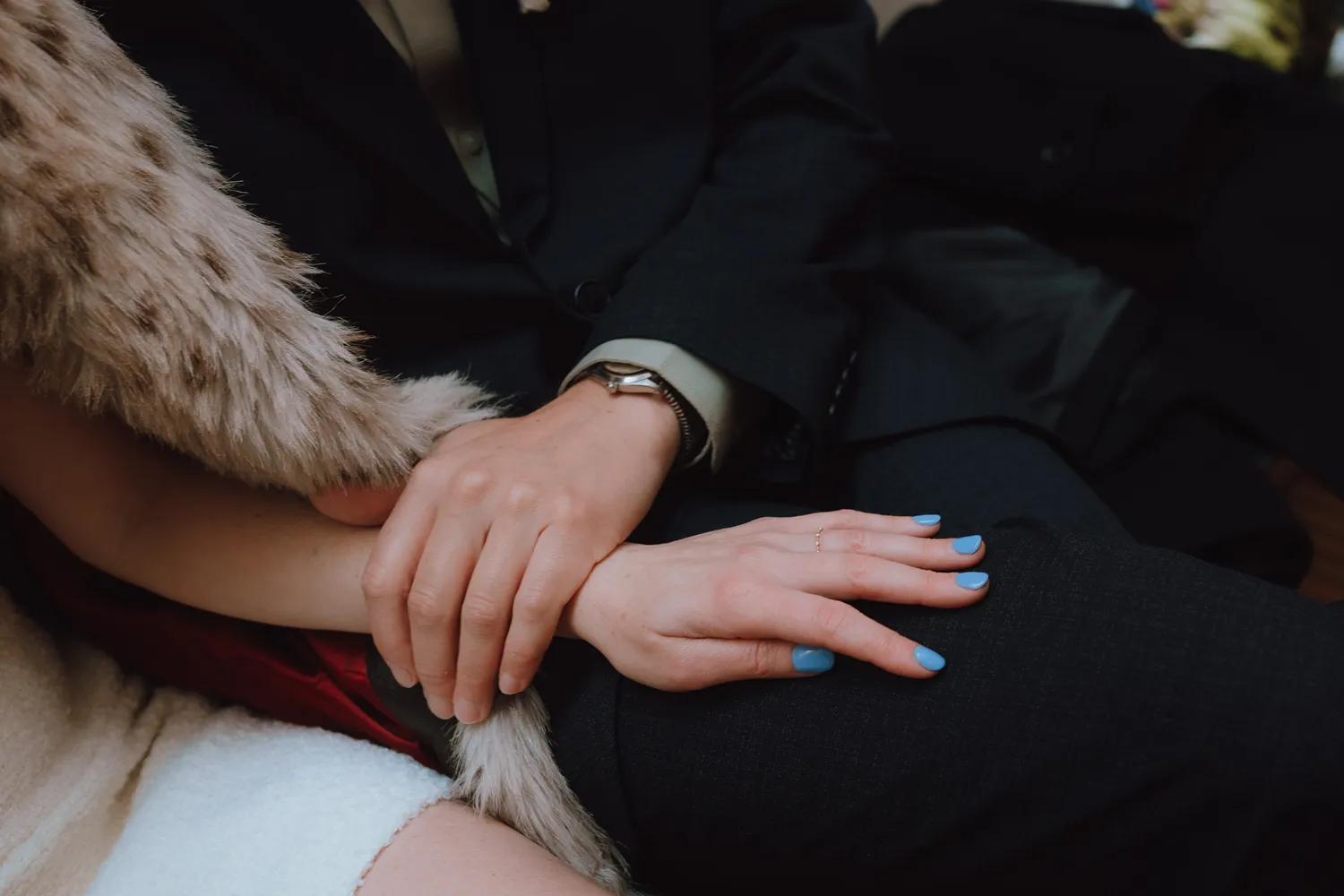 Close-up of wedding rings and hands during civil wedding in Odense.