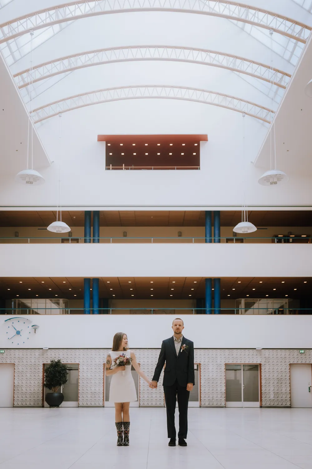 Modern architecture inside Odense City Hall wedding venue.