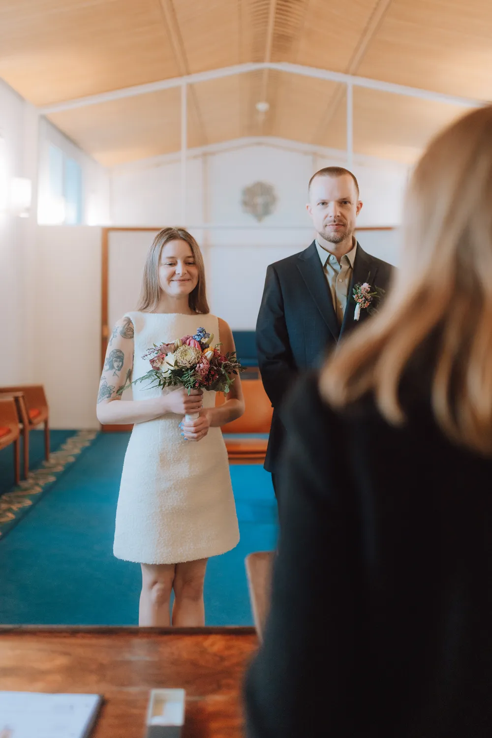 Documentary wedding photography inside Odense City Hall ceremony room.