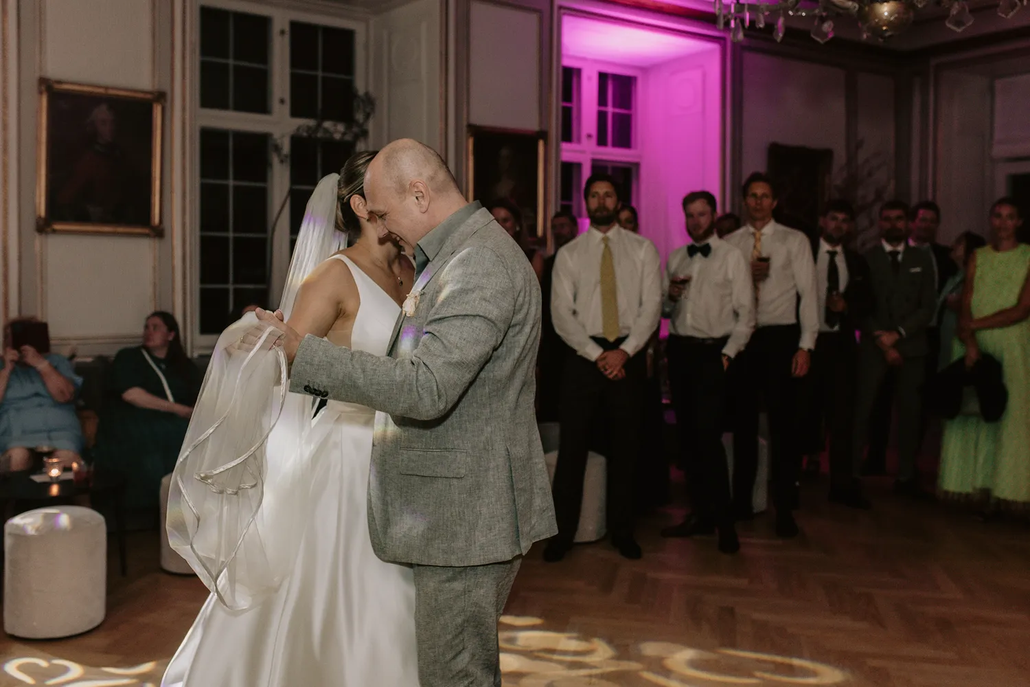 Elegant wedding party inside Danish castle venue by Juniper Picture Lab