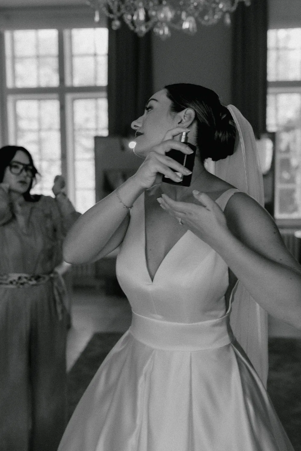 Bride getting ready at Holckenhavn Slot before timeless September wedding in Denmark