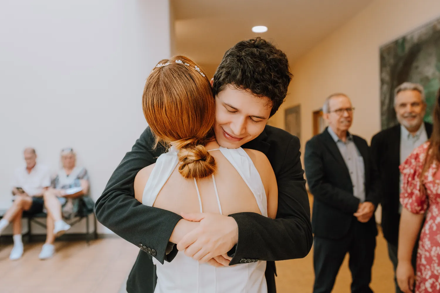 Natural guest moments after an intimate wedding at Odense City Hall