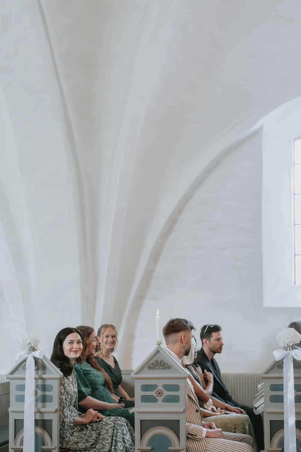 Guests crying during emotional Danish church wedding ceremony