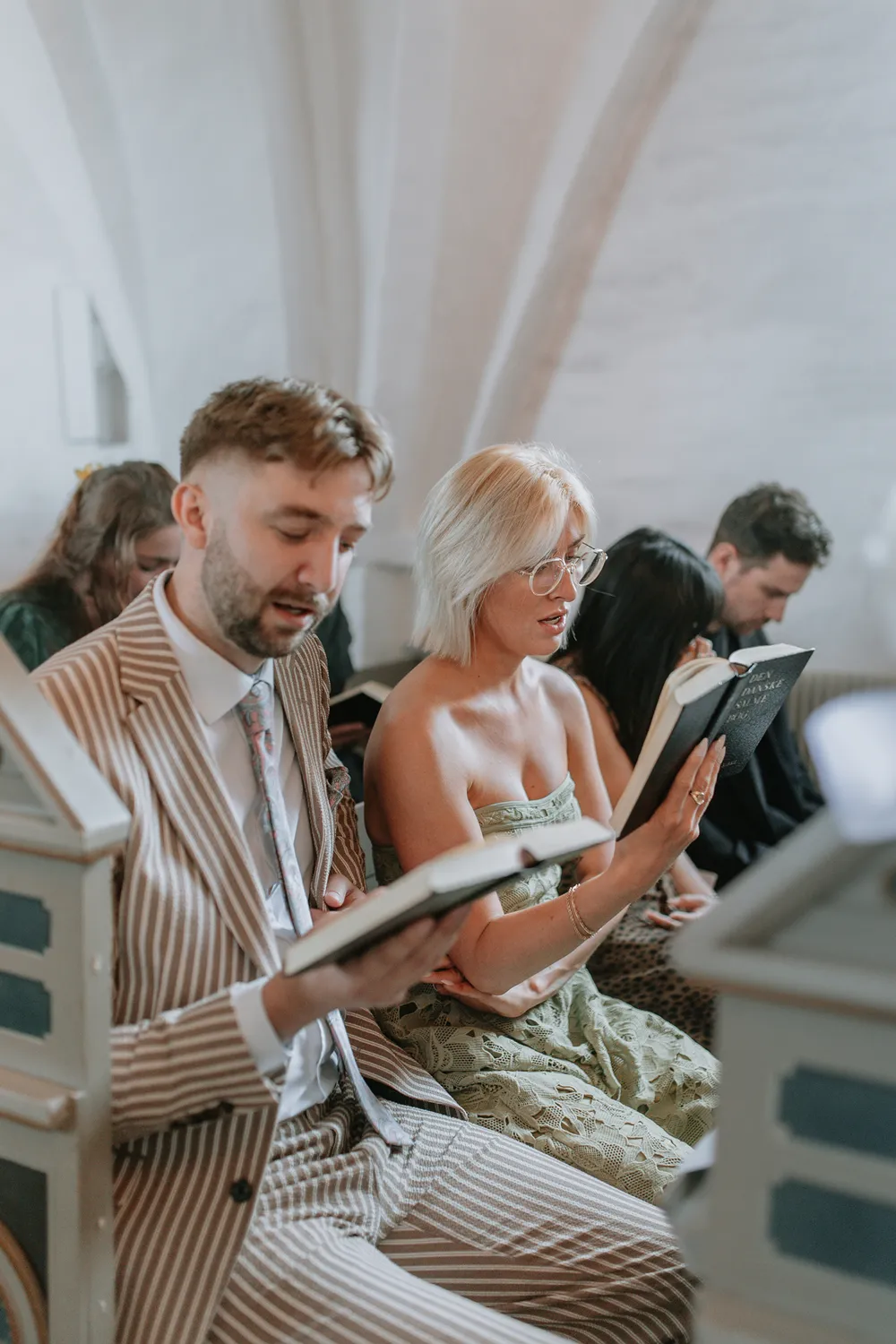 Guests crying during emotional Danish church wedding ceremony