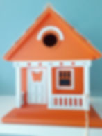 A colorful bird house
