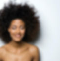 Portrait of a Smiling Woman with Curly Hair_edited.jpg