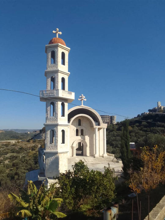 Mar Ephrem Church in Dhour Safra, Tartous, Syria — exterior view of the bell tower and entrance 2025.