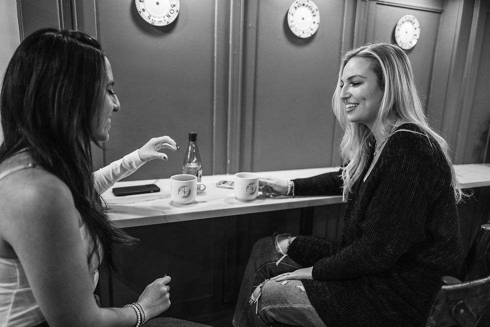 Two friends enjoying a coffee at Lokl Cafe