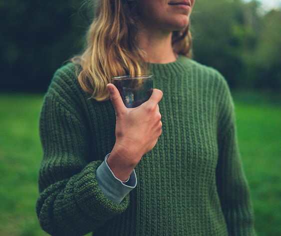 Woman drinking wine on holiday