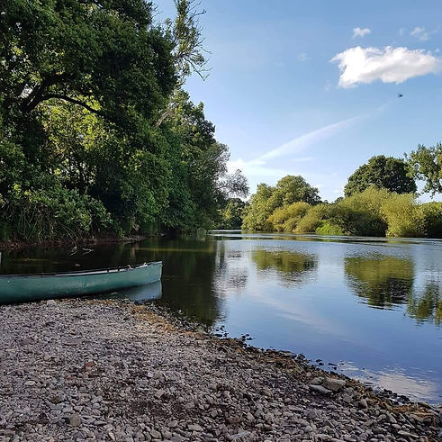 photo of a canoe by the river on a beach near Arley, Worcestershire