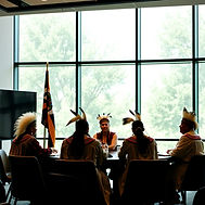 modern native american tribal council sitting in session.jpg
