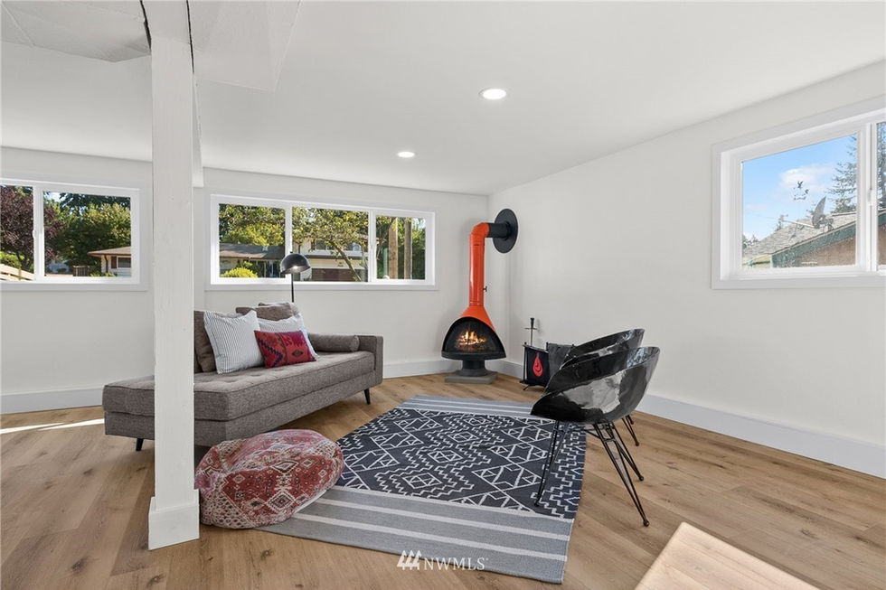 Basement - After (with the original MCM fireplace!)