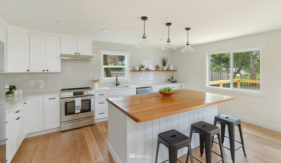 Kitchen - complete with an island and floating shelf hand-crafted by a local artisan