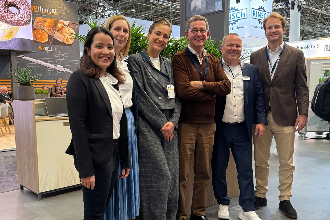 Representatives of NETZSCH Grinding & Dispersing and Dutch Structuring Technologies (DST) at interpack 2026 announcing their strategic partnership for structured protein and alternative food innovations.
