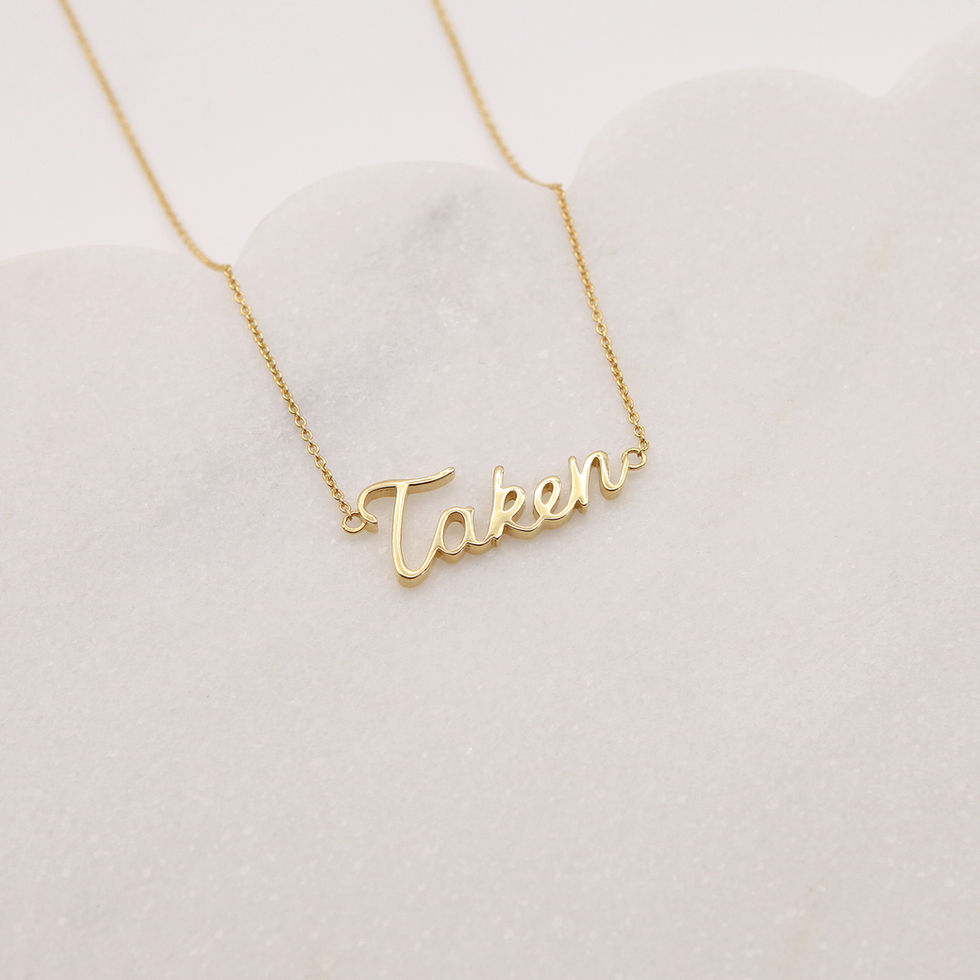 Gold Taken necklace on white background, jewelry product photography, The Single Edit