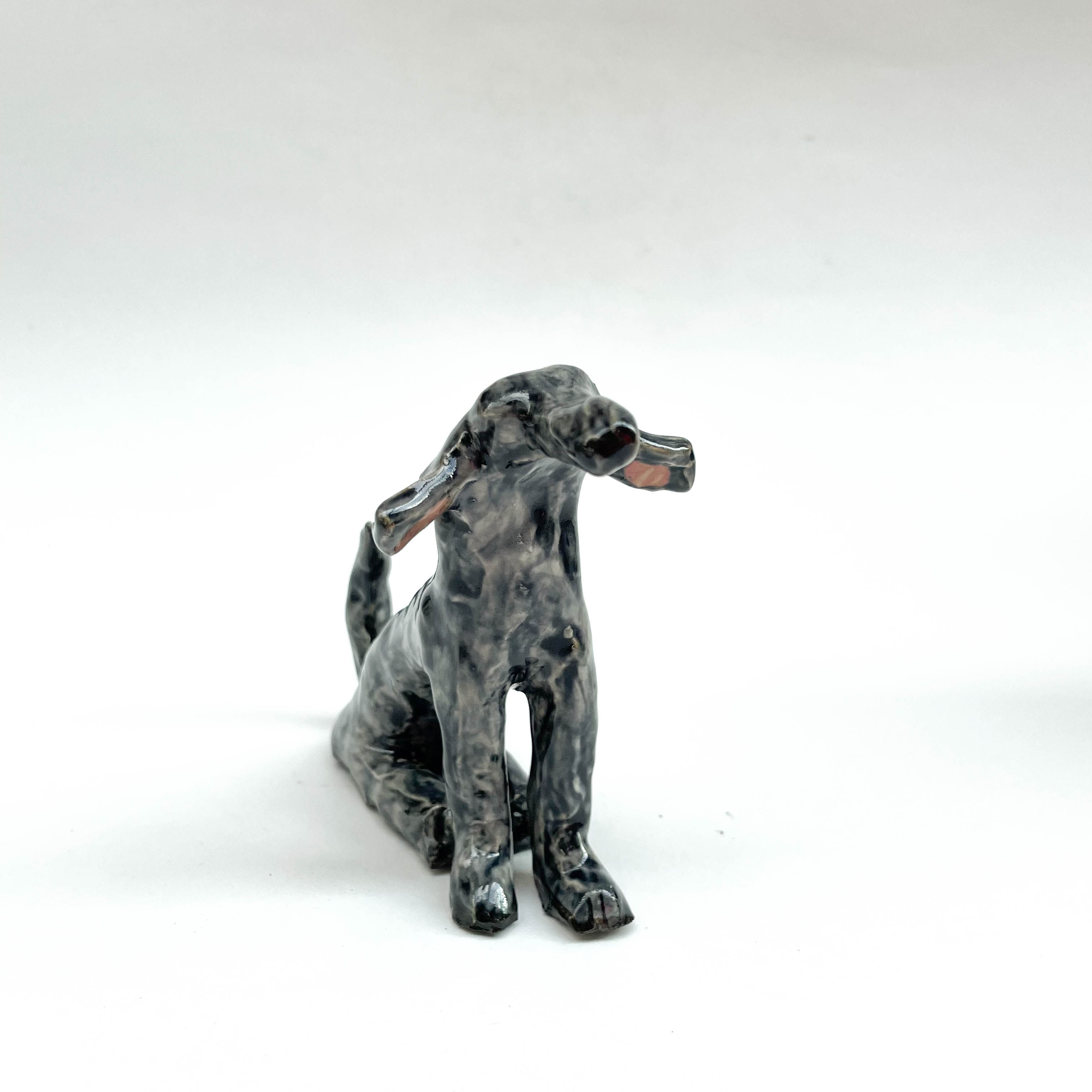 Grey dog sculpture