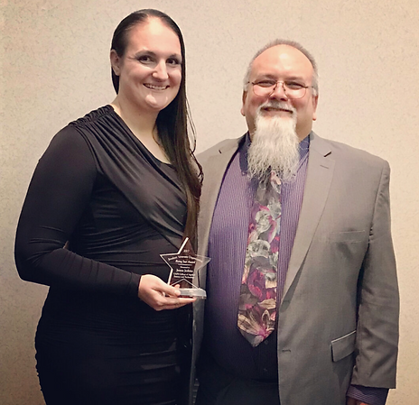 Jenna receiving the Rising Star award for the welding departmant