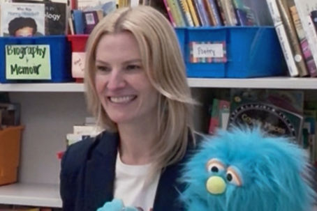 Doc Holbrook and her puppet Mike the Morpheme Manipulating Monster. Doc uses Mike to help teach phonological awareness. 