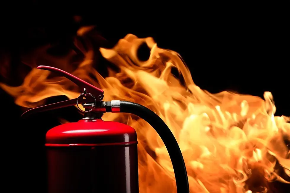 A fire extinguisher stands prominently against a black background, symbolizing essential fire safety measures by LA HFSi.