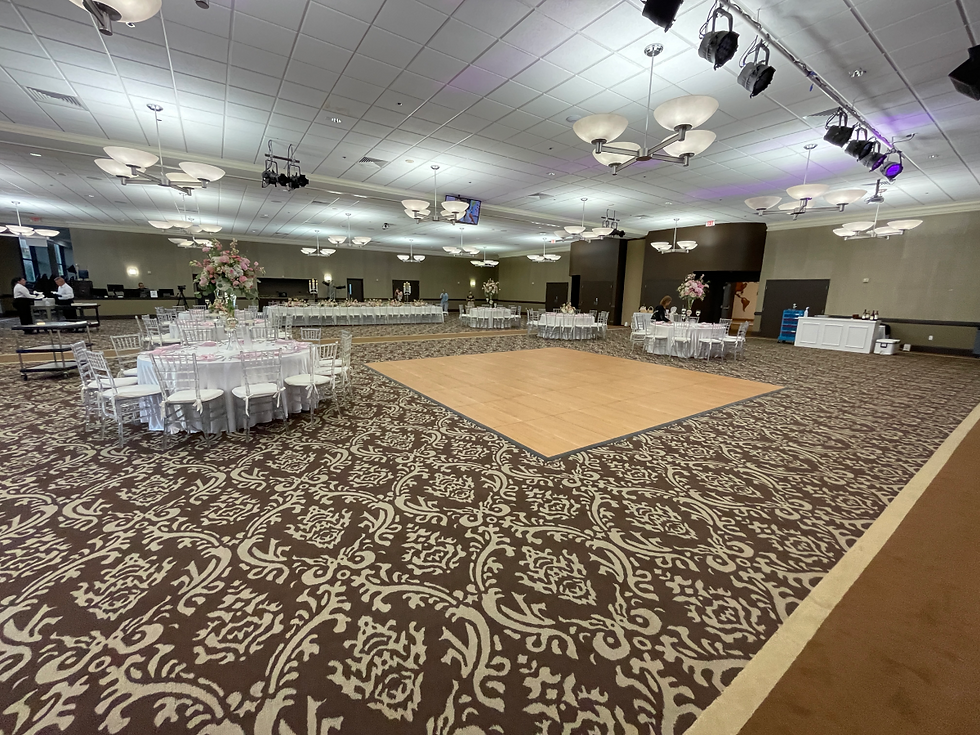 18x18 SnapLock portable dance floor setup over carpet in a ballroom