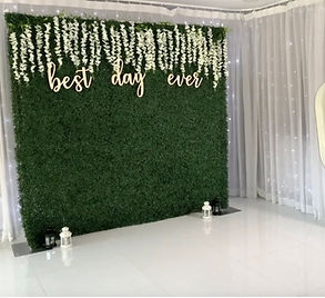 Grass backdrop for photo booth
