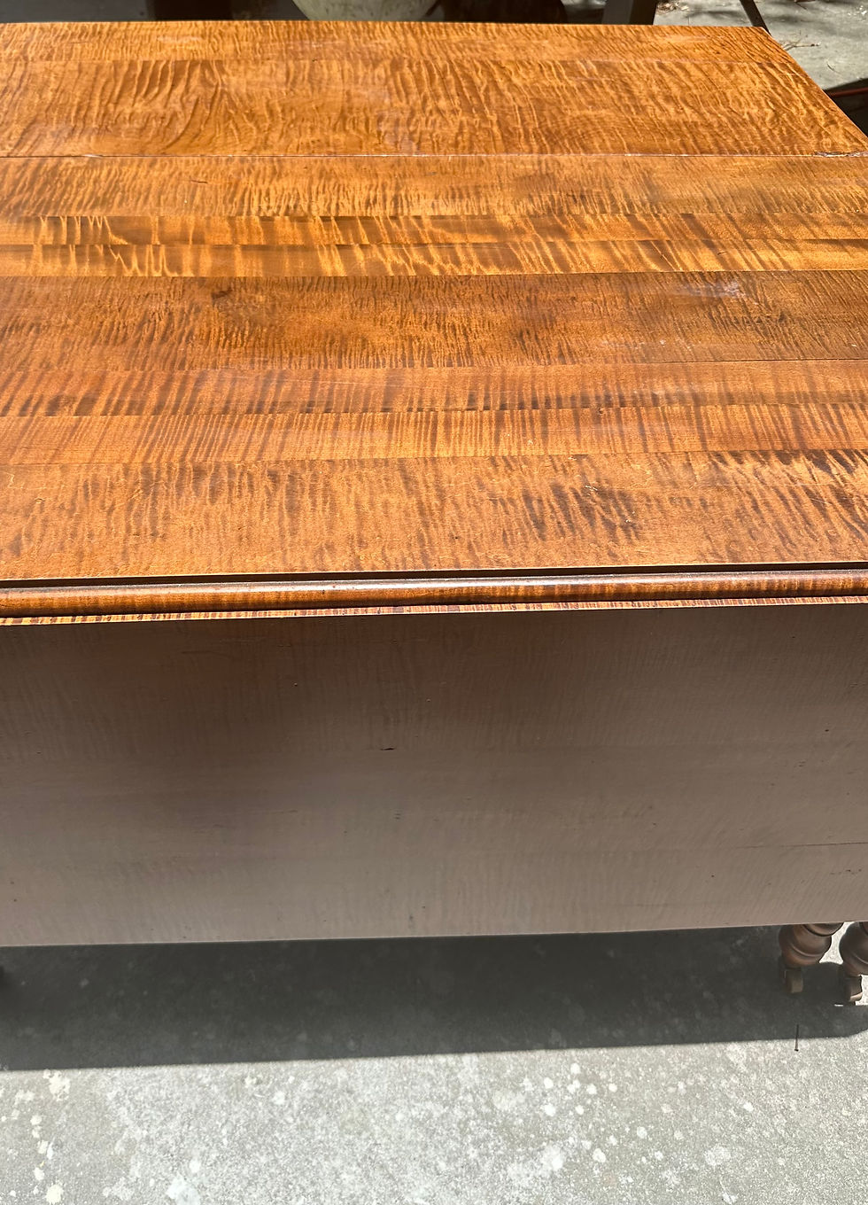 Thumbnail: 19th Century American Sheraton Tiger Maple Drop Leaf Dining Table