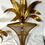 Thumbnail: Pair of Italian 1950s Hollywood Regency Gilt Tole Palm Motif Wall Sconces