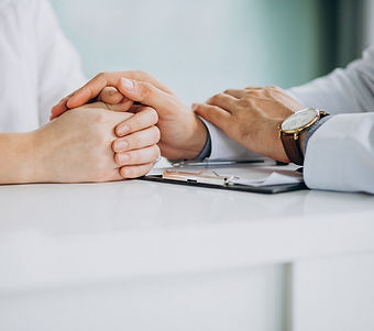 Doctor Comforting Patient During Health Insurance Consultation