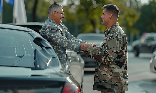 Two Military Officers Shaking Hands Near Parked Car