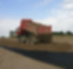 truck dumping gravel over geotextille