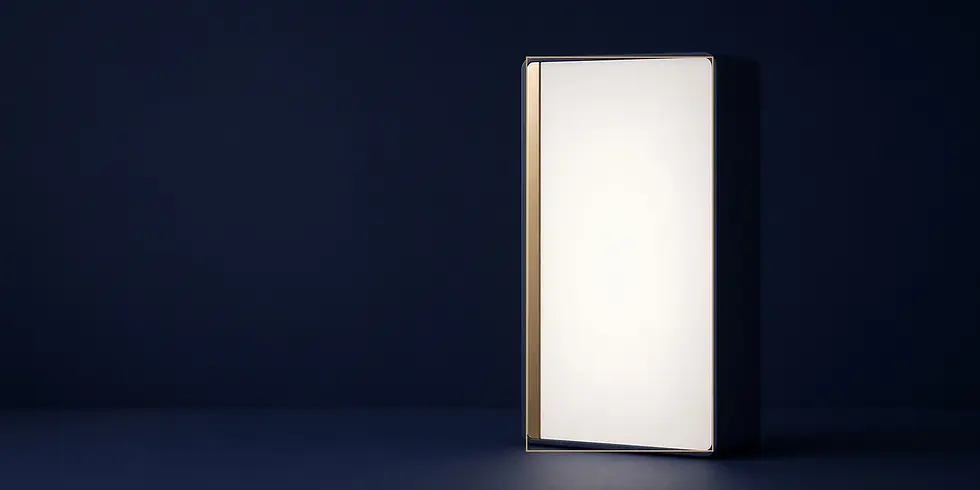 Rectangular light therapy box glowing on a navy desk with a thin gold morning stripe and thin gold rim.