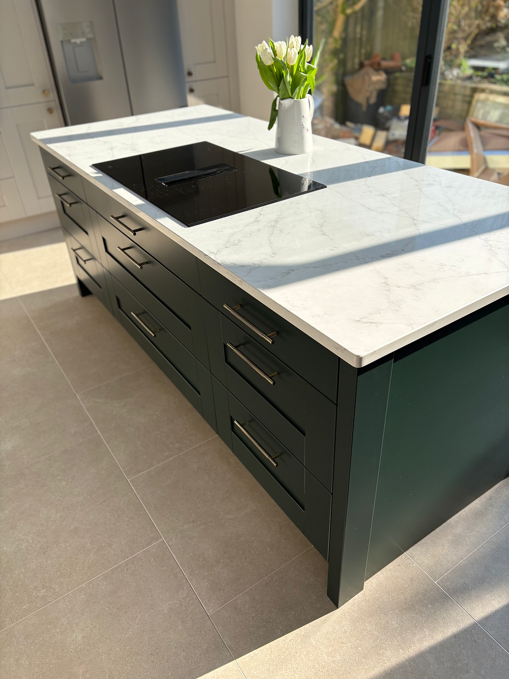 Modern kitchen island with induction hob