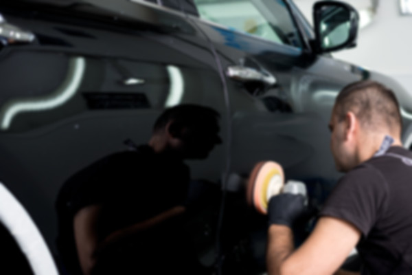 Man Polishing Car