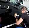 Man Polishing Car