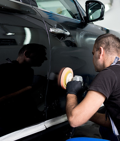 Man Polishing Car