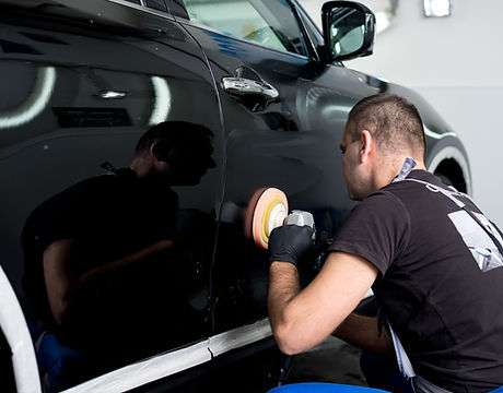 Man Polishing Car