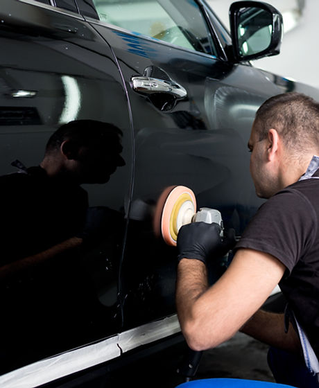 Man Polishing Car