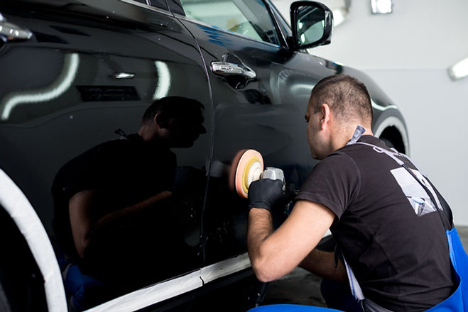 Man Polishing Car