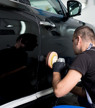 Man Polishing Car