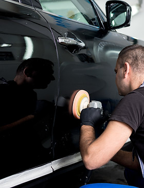 Man Polishing Car