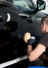 Man Polishing Car