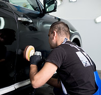 Man Polishing Car