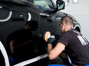 Man Polishing Car