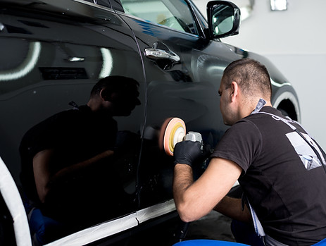 Man Polishing Car