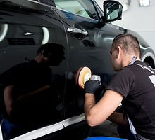 Man Polishing Car